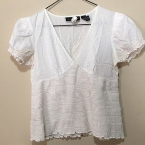 Off white delicate top.